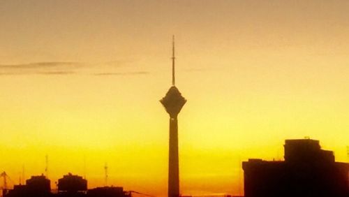 Communications tower at sunset