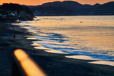 Scenic view of sea against sky during sunrise