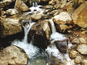 Stream flowing through rocks