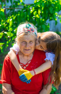 Side view of mother and daughter