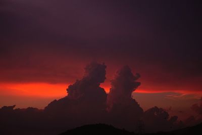 Low angle view of silhouette mountain against sky during sunset