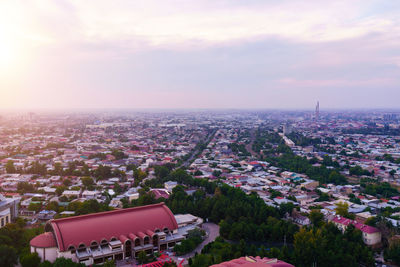 High angle view of townscape against sky during sunset