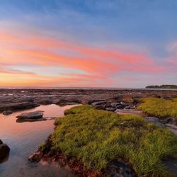 Scenic view of sea against sky during sunset