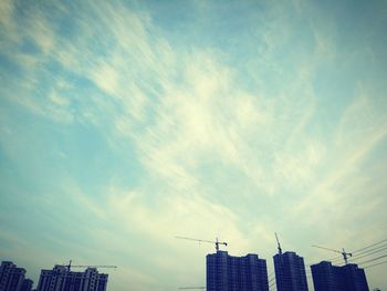 Low angle view of modern buildings against sky