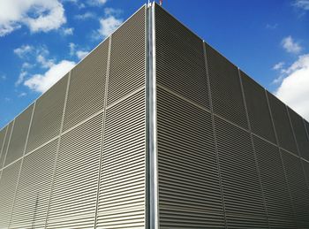 Low angle view of modern building against sky