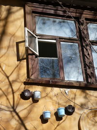 Low angle view of old window on table
