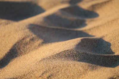 High angle view of shadow on sand