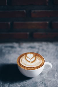 Coffee cup on table