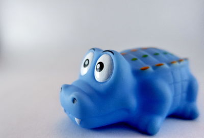 Close-up of stuffed toy against white background