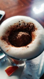 Close-up of cappuccino on table