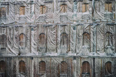 Full frame of tarp covered building