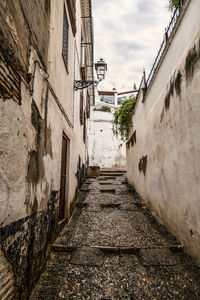 Narrow alley along buildings