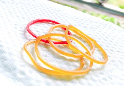 Close-up of wedding rings on table