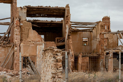 Abandoned built structure against sky