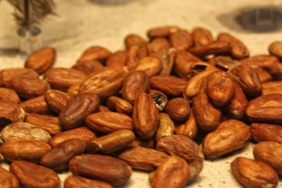 Close-up of coffee beans on table