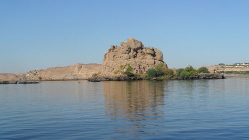 Scenic view of sea against clear blue sky