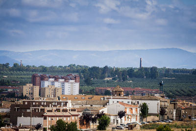 High angle shot of townscape against sky