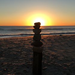 Scenic view of sea at sunset