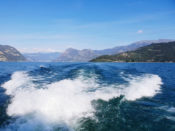 Scenic view of sea against blue sky