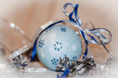 Close-up of christmas ornaments on table