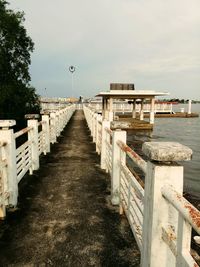 View of pier over sea against sky