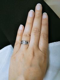 High angle view of hands of woman