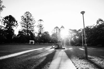 Man on road against clear sky