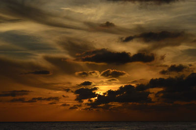 Dark sunset water beach.