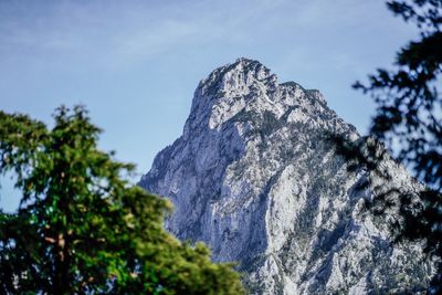 Low angle view of rocks against sky