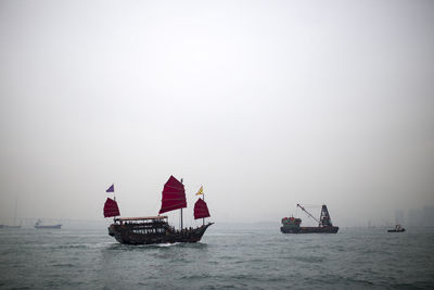 Boats sailing in sea