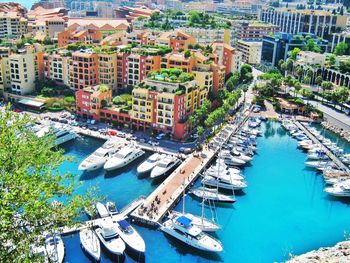 High angle view of boats moored at harbor