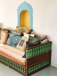 Pillows on sofa in living room at home