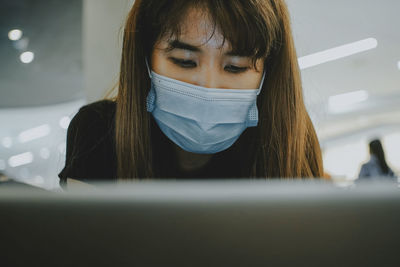 Portrait of a woman using mobile phone