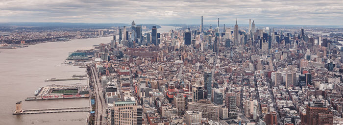 Aerial view of cityscape against sky