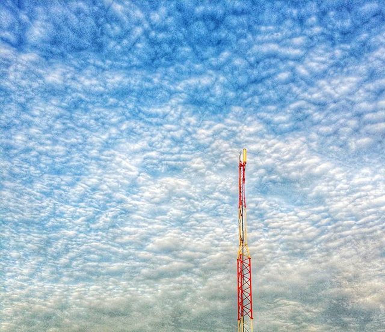 LOW ANGLE VIEW OF BLUE SKY AND CLOUDS IN BACKGROUND