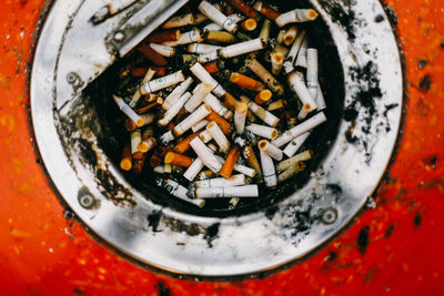 High angle view of cigarette in container