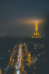 High angle view of illuminated buildings in city at night