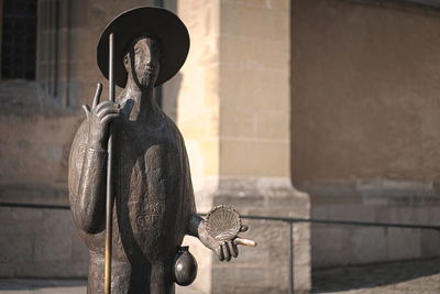 Close-up of statue against wall