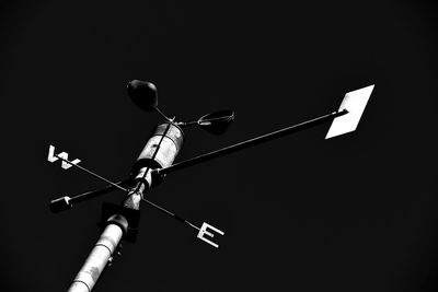 Low angle view of telephone pole against clear sky