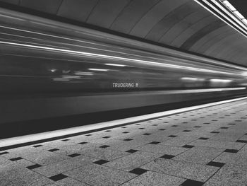 Blurred motion of train at subway station