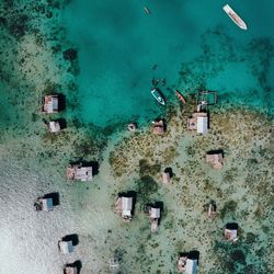 High angle view of people on sea shore