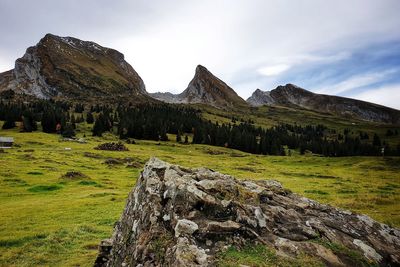 Scenic view of rocky mountains against sky