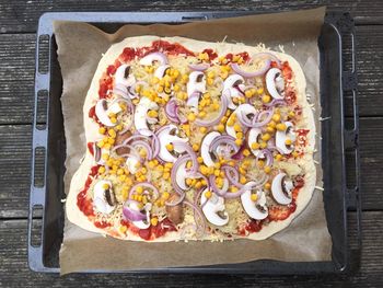 Directly above shot of pizza in baking sheet