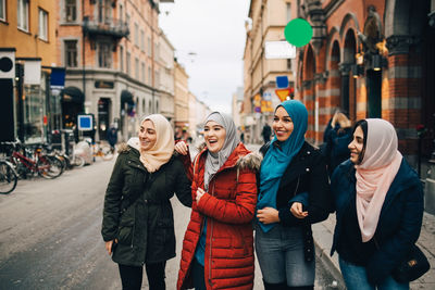 People on street in city during winter