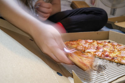 Midsection of woman preparing food