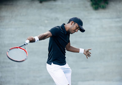 Man playing tennis