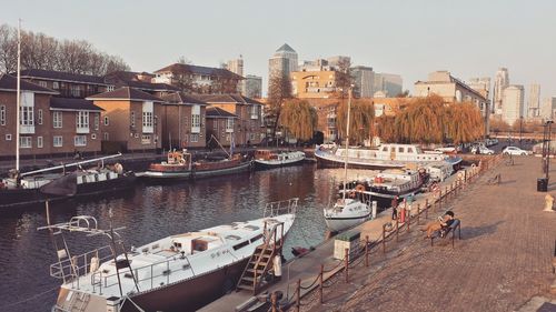 Boats moored at waterfront