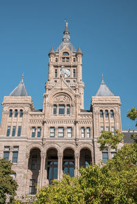 View of salt lake city and county building with clear blue sky in background