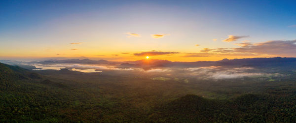 Scenic view of landscape against sky during sunset