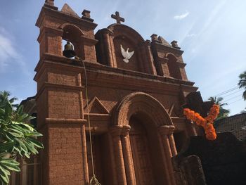 Low angle view of temple against sky